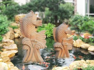 雕塑制作廠家晚霞紅石雕噴水魚